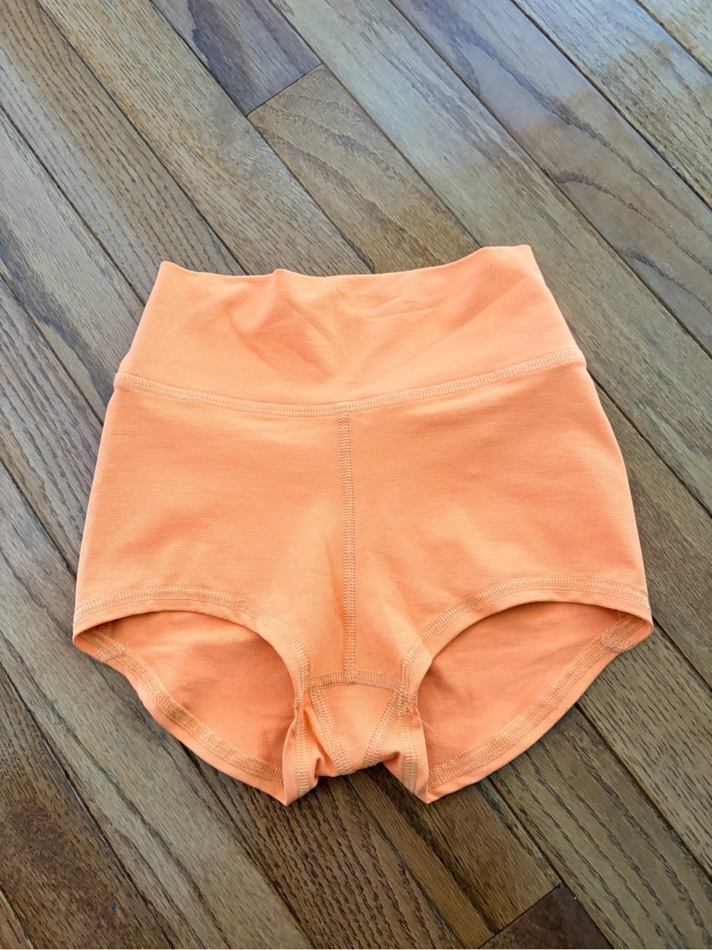 Five Aura 2” everyday shorts in orange cream